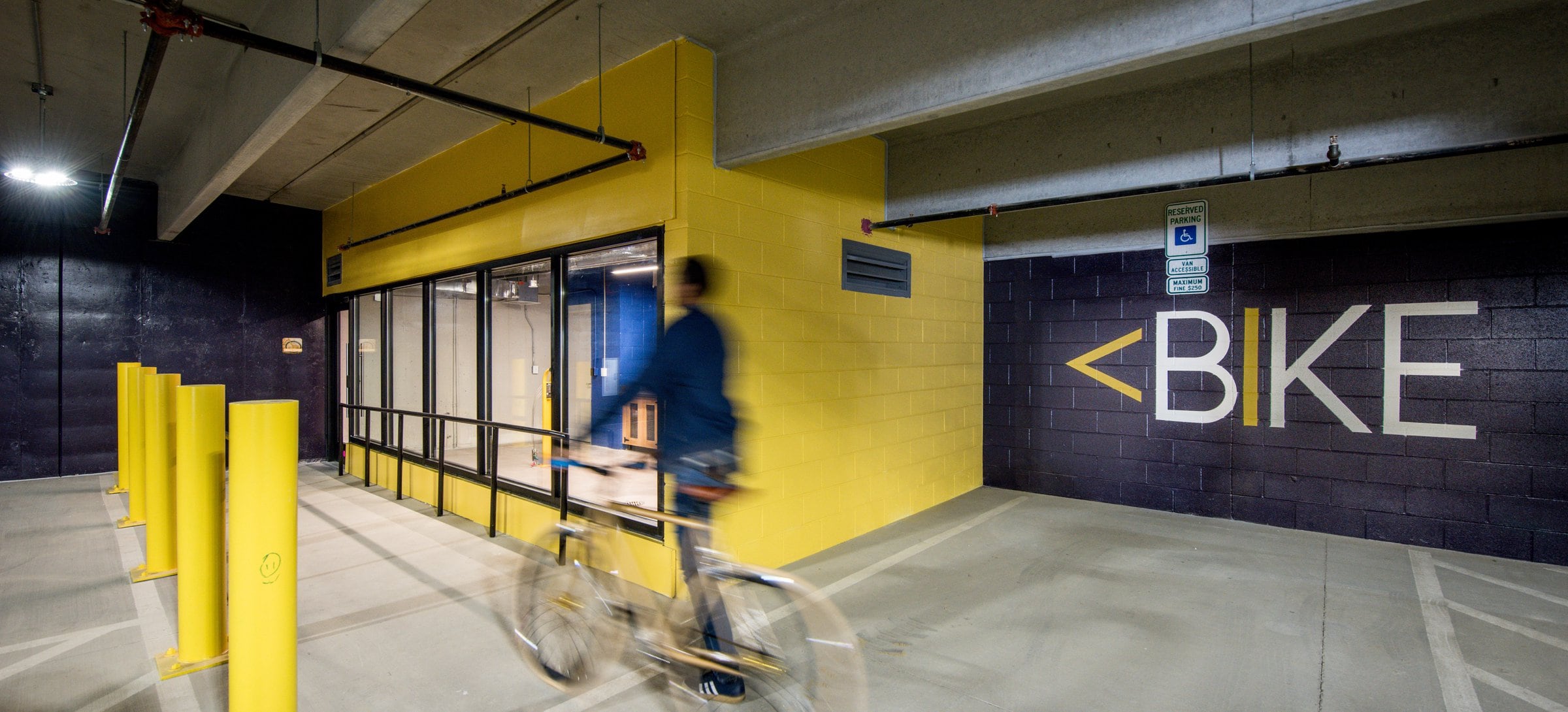 Parking garage with bike repair room
