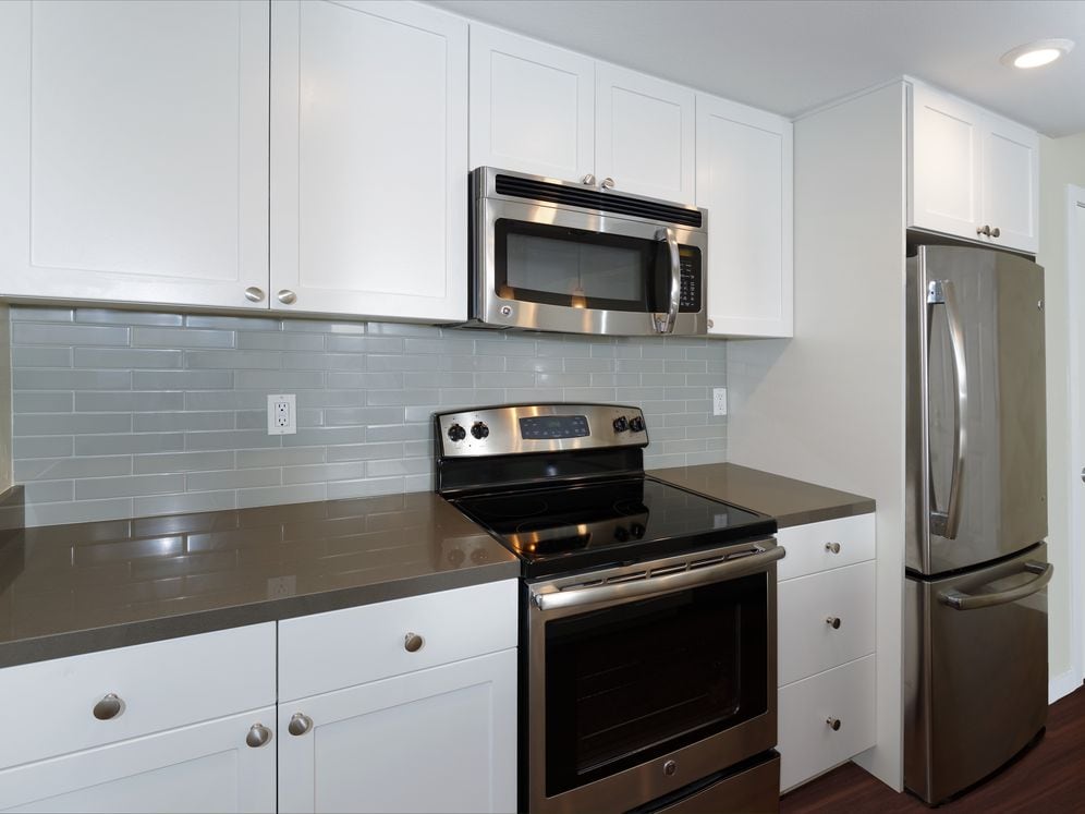Kitchens With Quartz Countertops Tile Back Splash And Stainless Steel Appliances