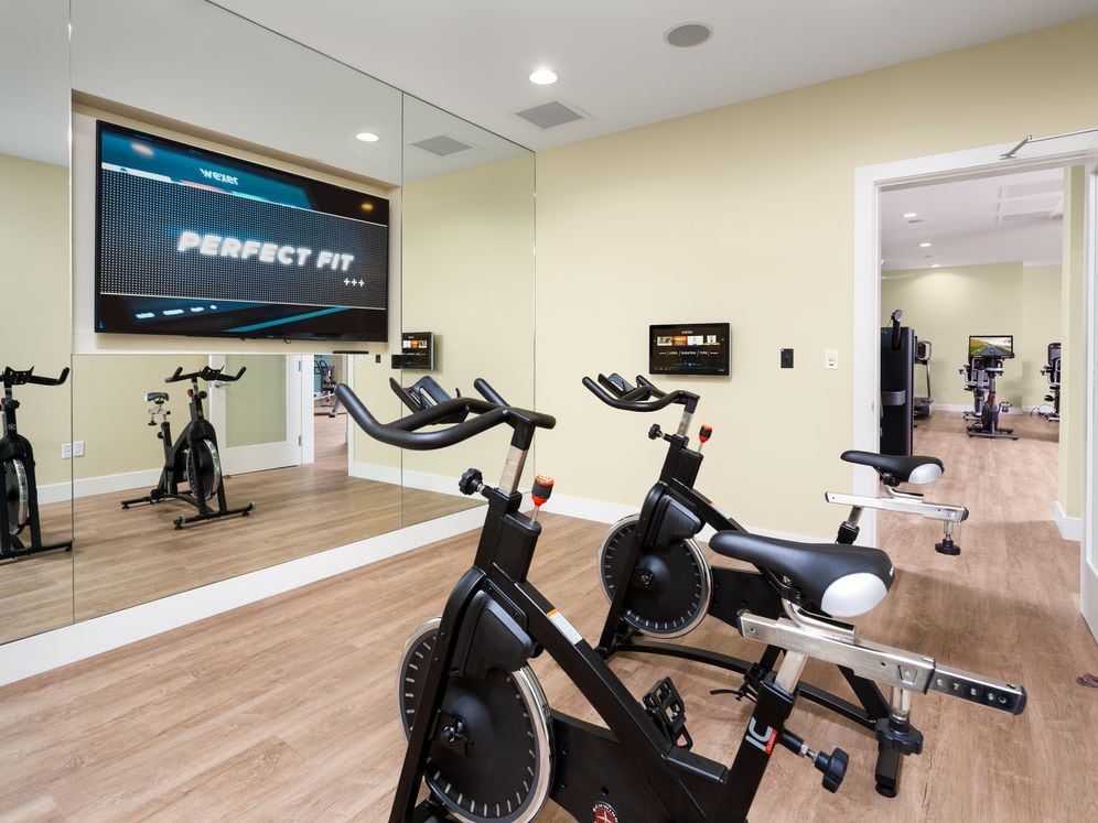 Expanded fitness center with Fitness on DemandTM programming