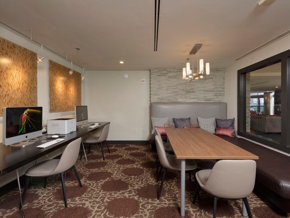 Business center with computer workstations, printer and WiFi access