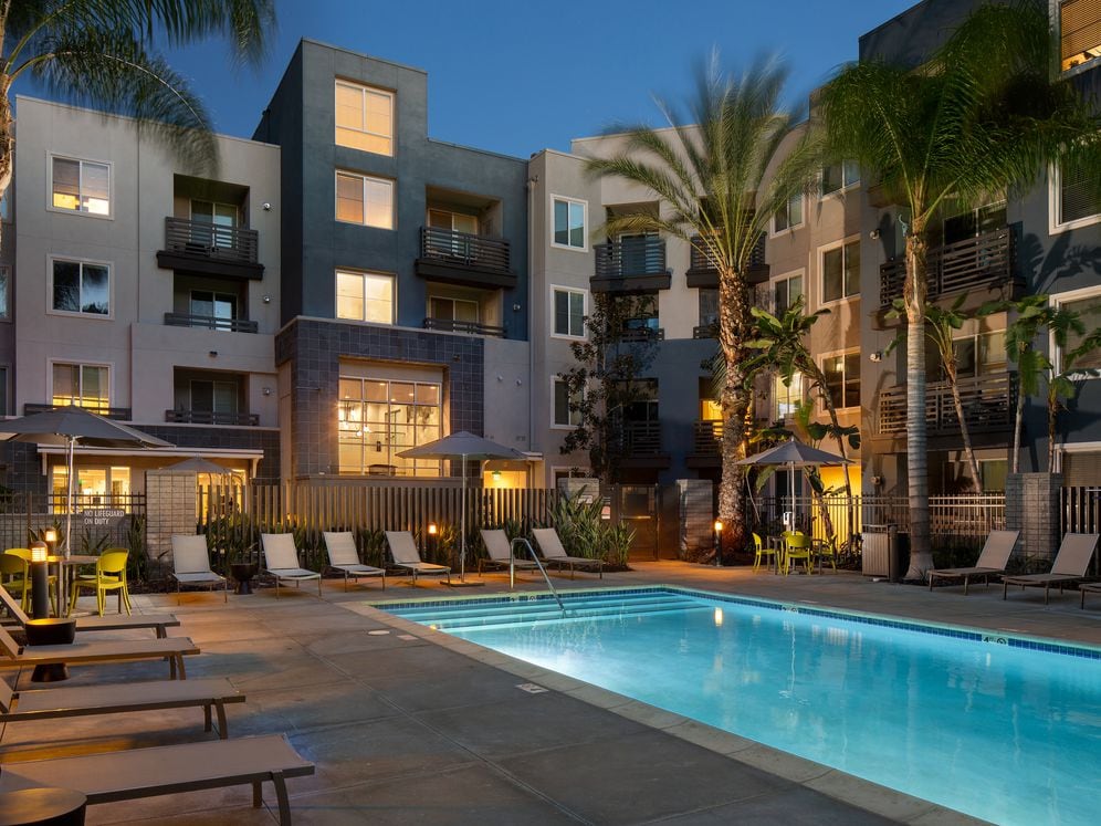 Swimming pool and sundeck at dusk