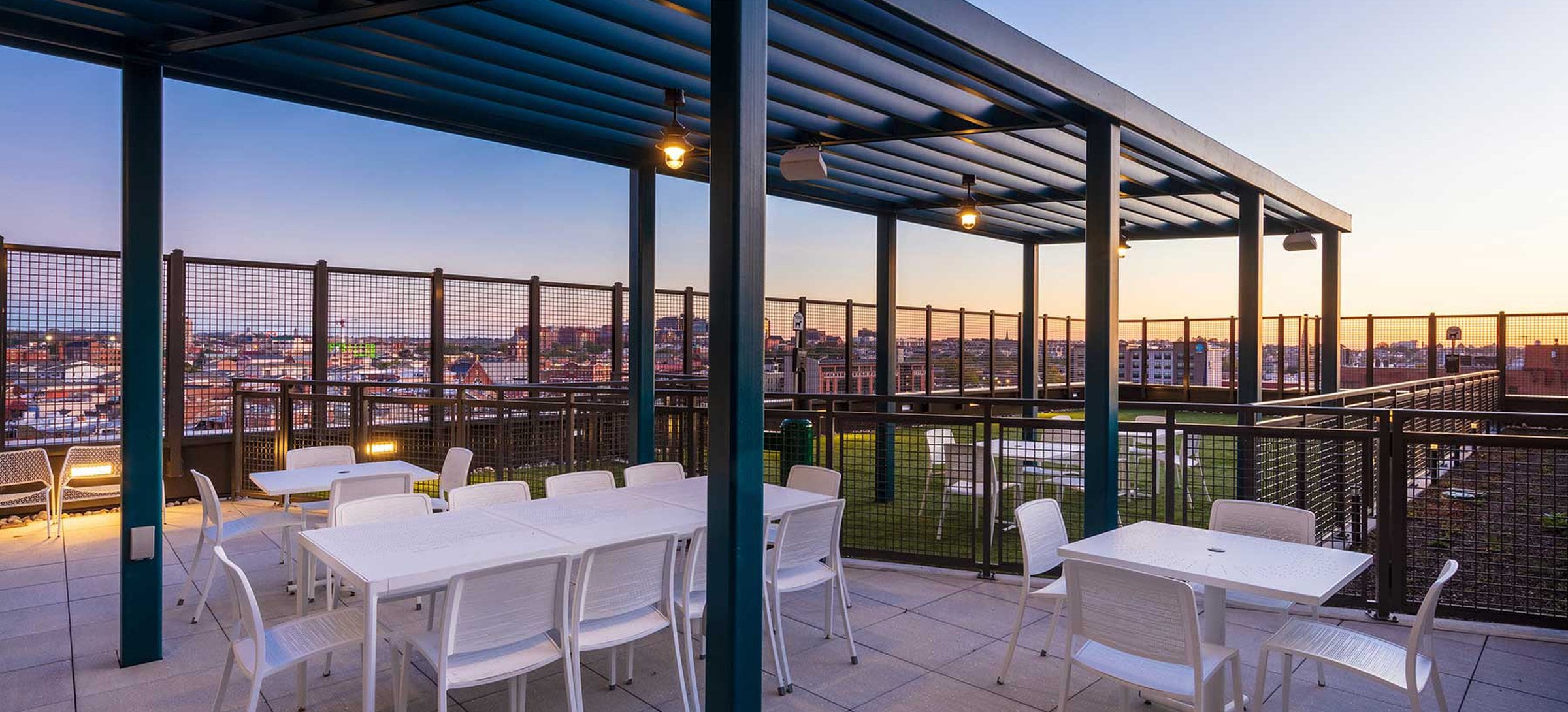 8th Floor Outdoor terrace with dining tables and seating