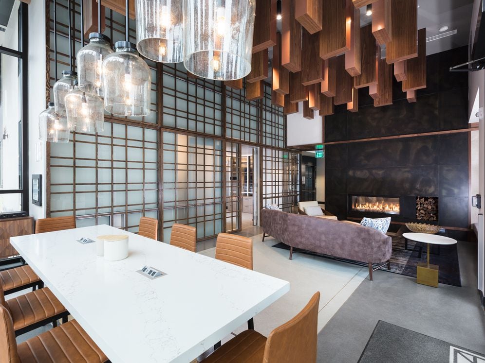 Resident lounge with common area seating and fireplace