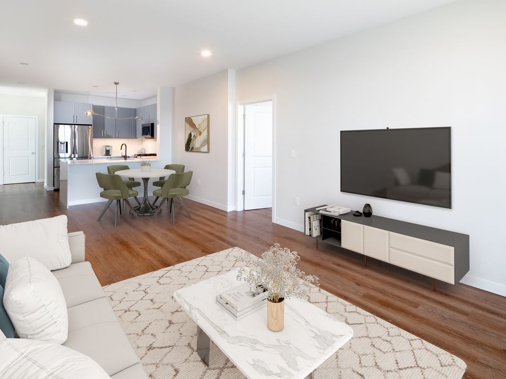 Signature Collection living room, dining area, and kitchen
