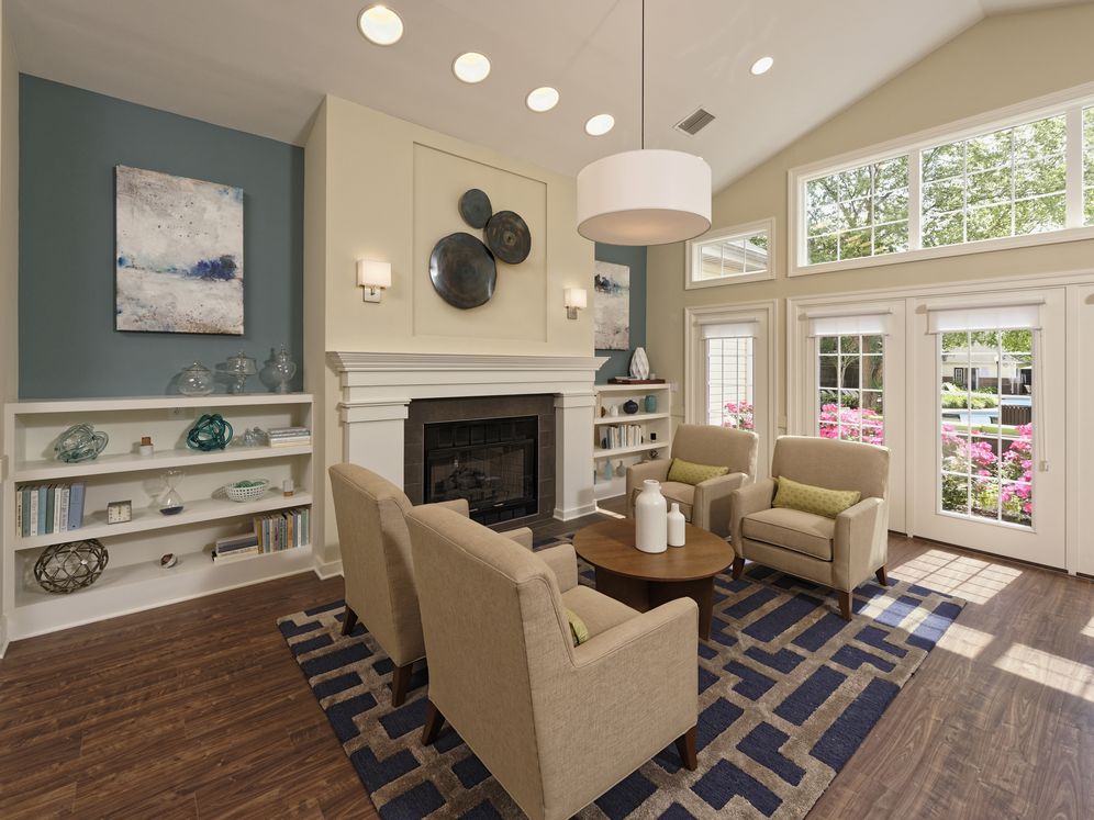 Leasing office with fireplace and lounge seating