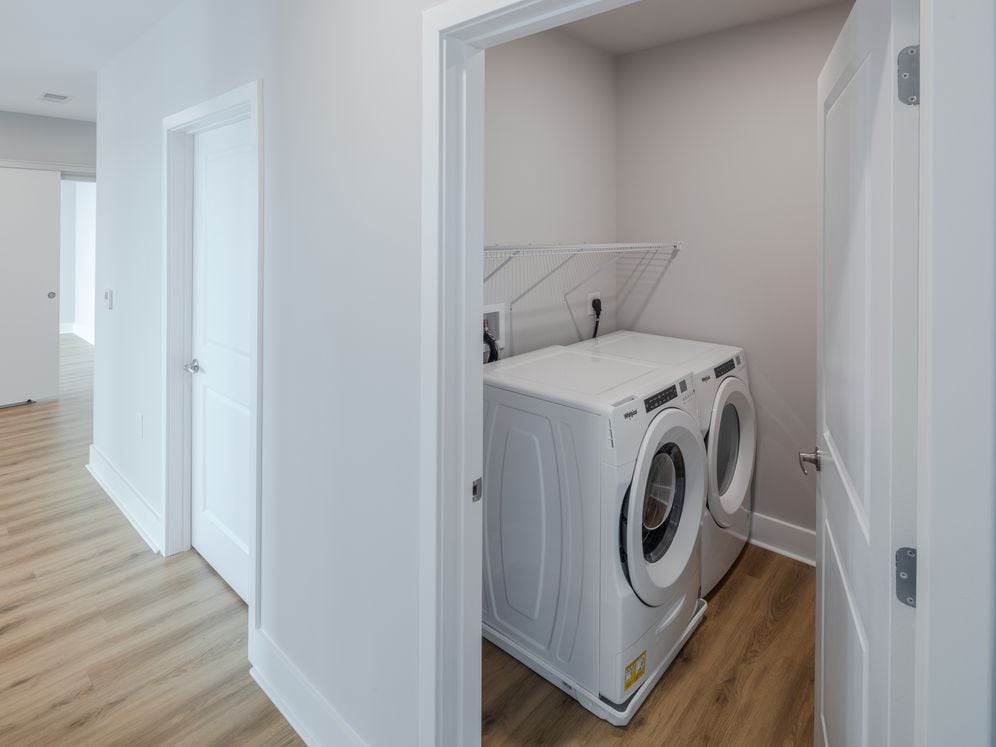 Penthouse-level Signature Collection apartment homes with side-by-side washer and dryer