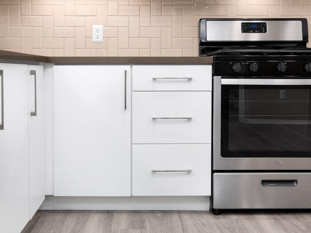 Newly renovated Design Scheme I kitchen with tile backsplash