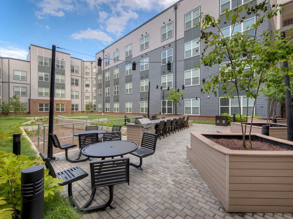 Second courtyard with dining and seating areas