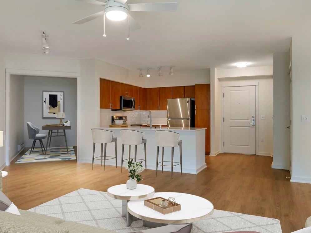 Newly renovated Finish Package II apartment homes feature an open concept with hard surface flooring