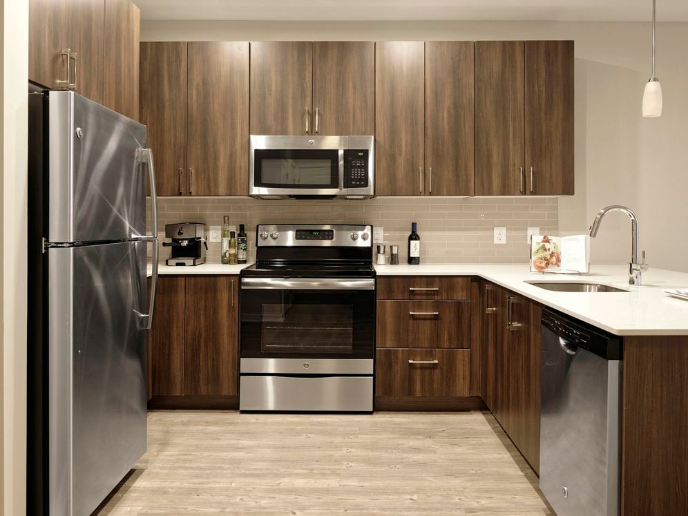 Hunt Valley - Finish Package II kitchen with granite countertops, stainless steel appliances and hard surface flooring