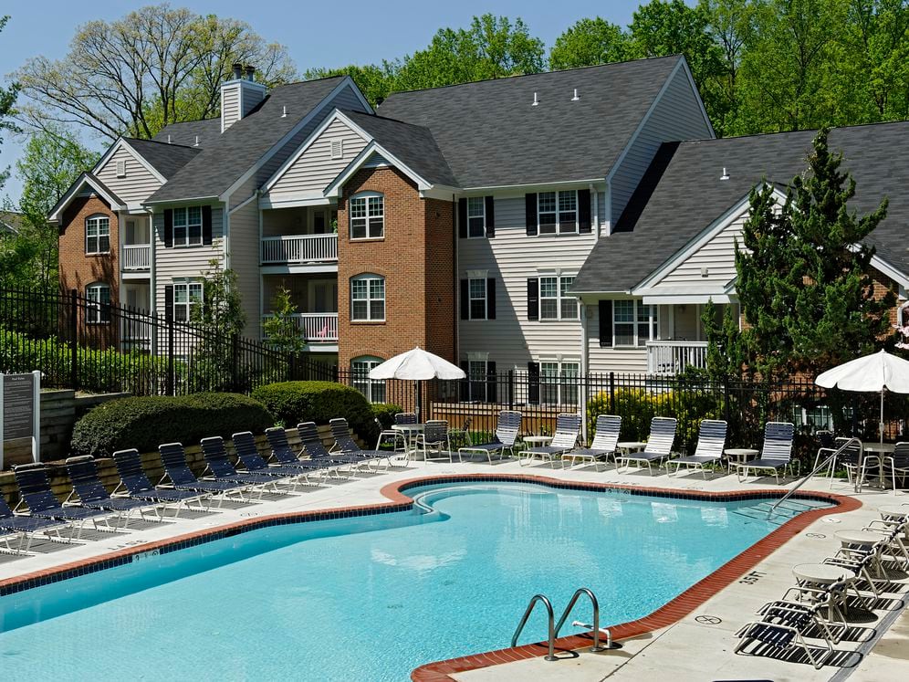 Swimming pool and sundeck with lounge seating