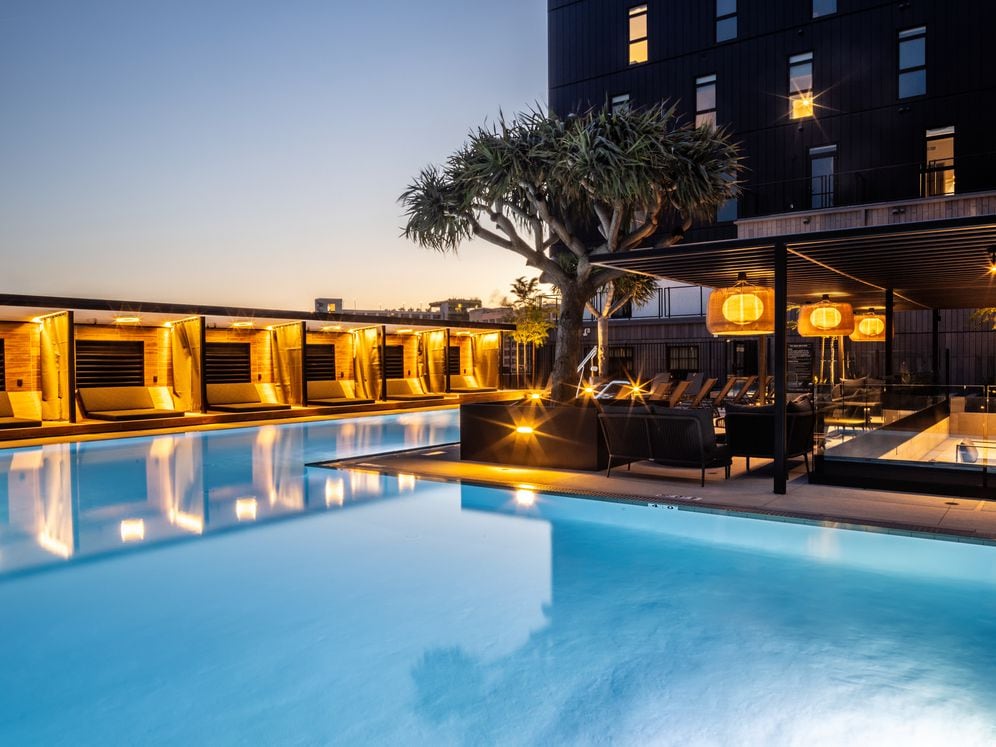 Pool and sundeck with cabanas
