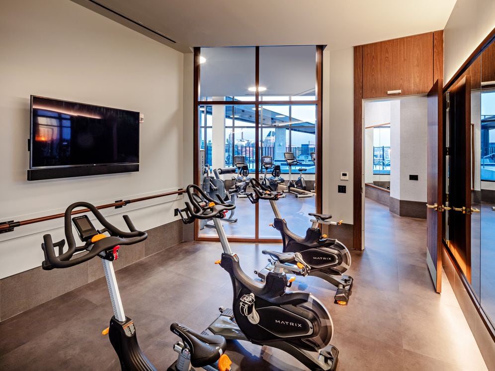 Fitness studio with spin bikes and virtual fitness programming