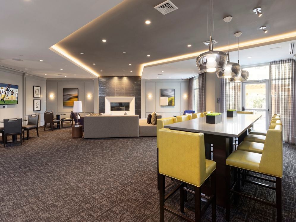 Hunt Valley - Lounge with fireplace, flat screen television and common area seating