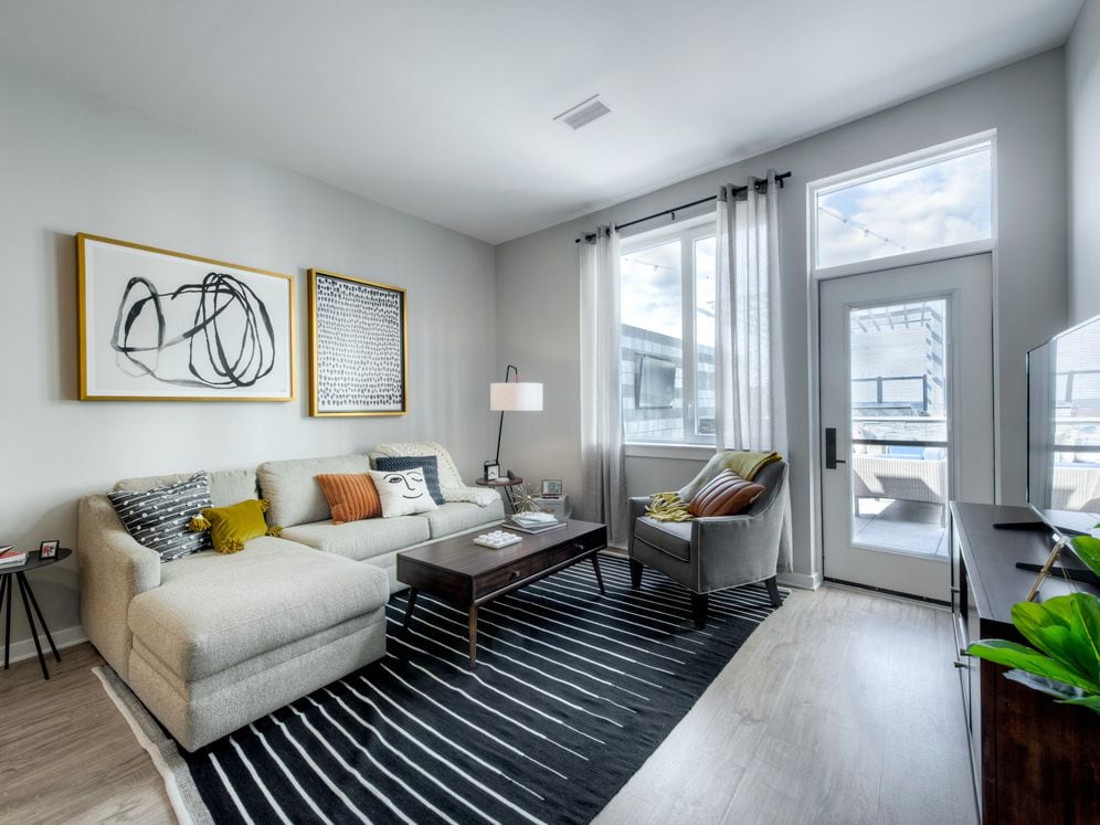 Spacious living areas with hard surface flooring balcony options
