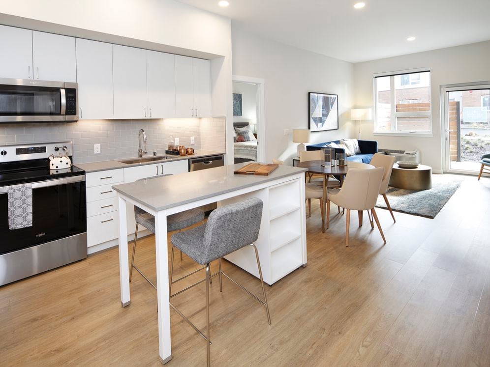 Phase II - Scheme C Kitchen, living, and dining areas with hard surface flooring