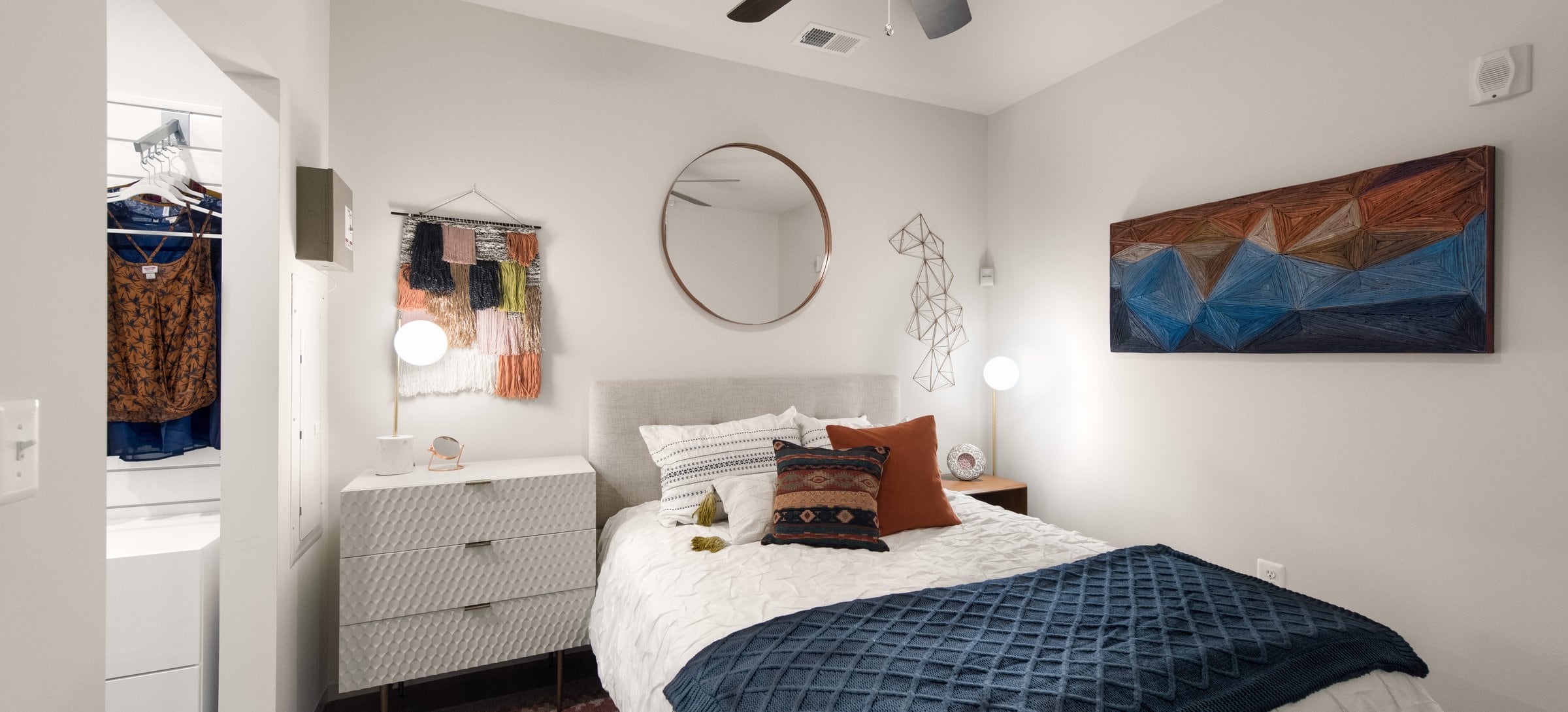 Bedroom with ceiling fan and hard surface flooring