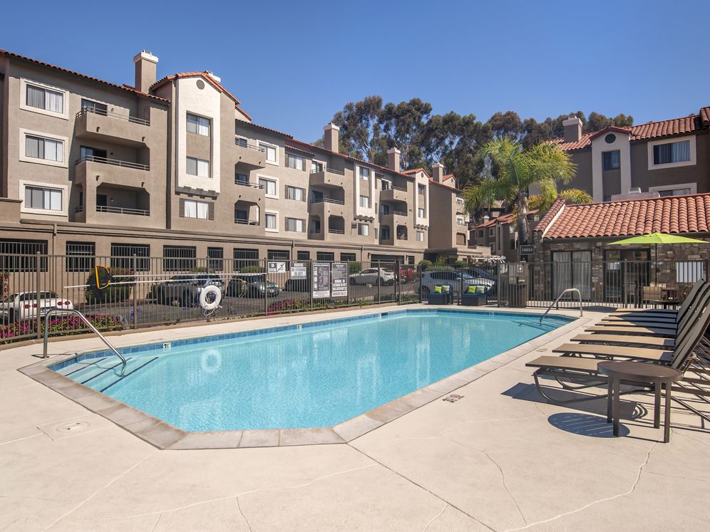 Swimming pool and sundeck with lounge seating